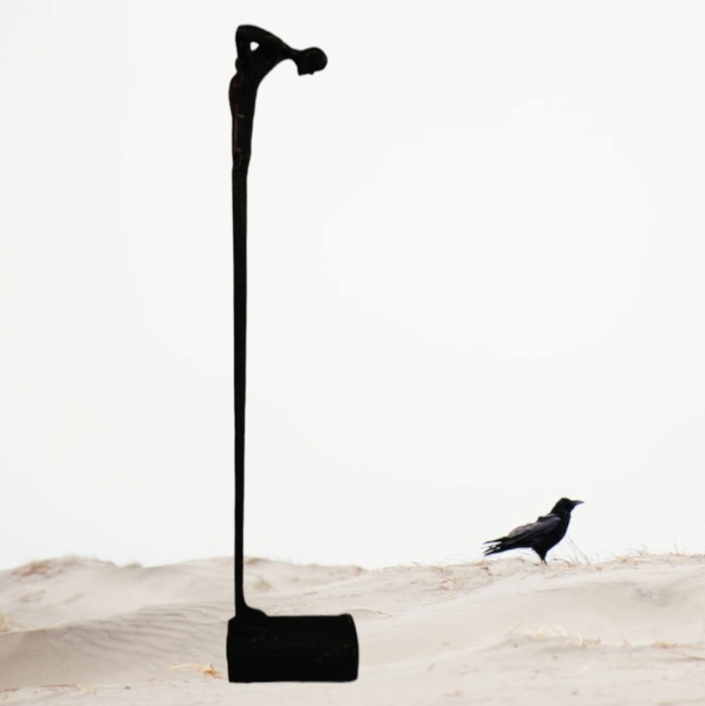 **Rustic Cast Metal Long Legged Man Figure Abstract Standing on Log